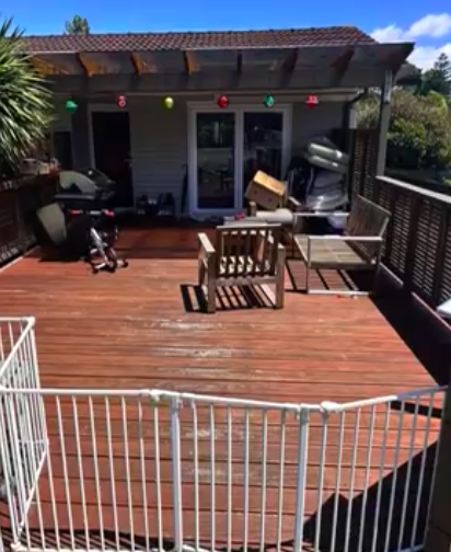 Home Extension Project: Deck with furniture and baby gate. Outdoor living space.